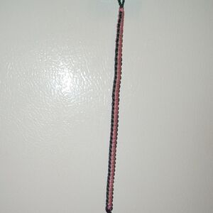 Elegant Pink and Black Braided Bracelet